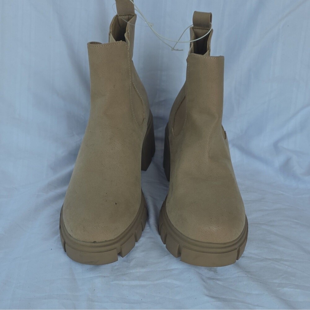 Beige brand a stylish and comfortable bootie women in US shoe size 8.